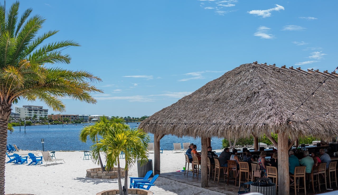 people gathered at a bar near the beach in Florida